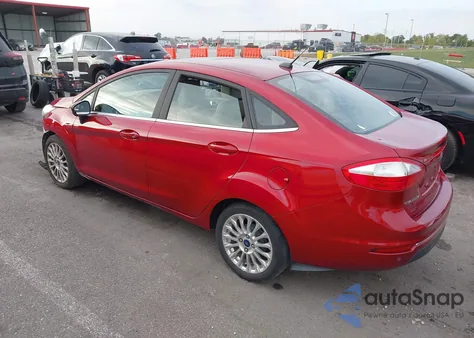 2015 Ford Fiesta Titanium z USA, uszkodzony, nr VIN 3FADP4CJ7FM175348